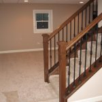 Stairs leading to a finished basement
