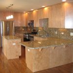 Kitchen with island and light cabinets